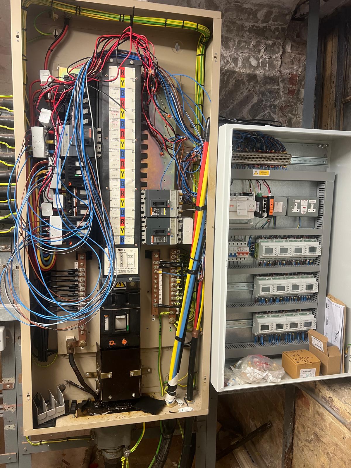School electrical distribution and monitoring cabinet during installation