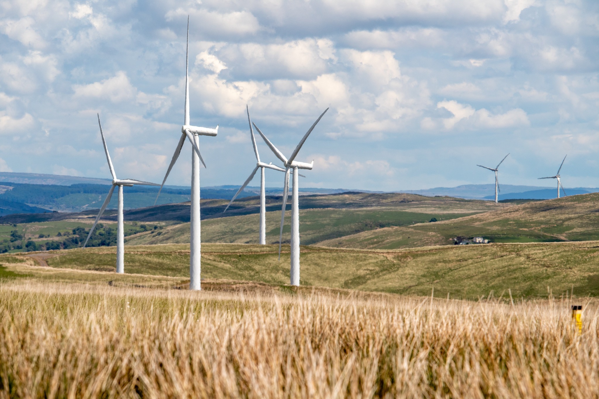 Wind turbines across open countryside